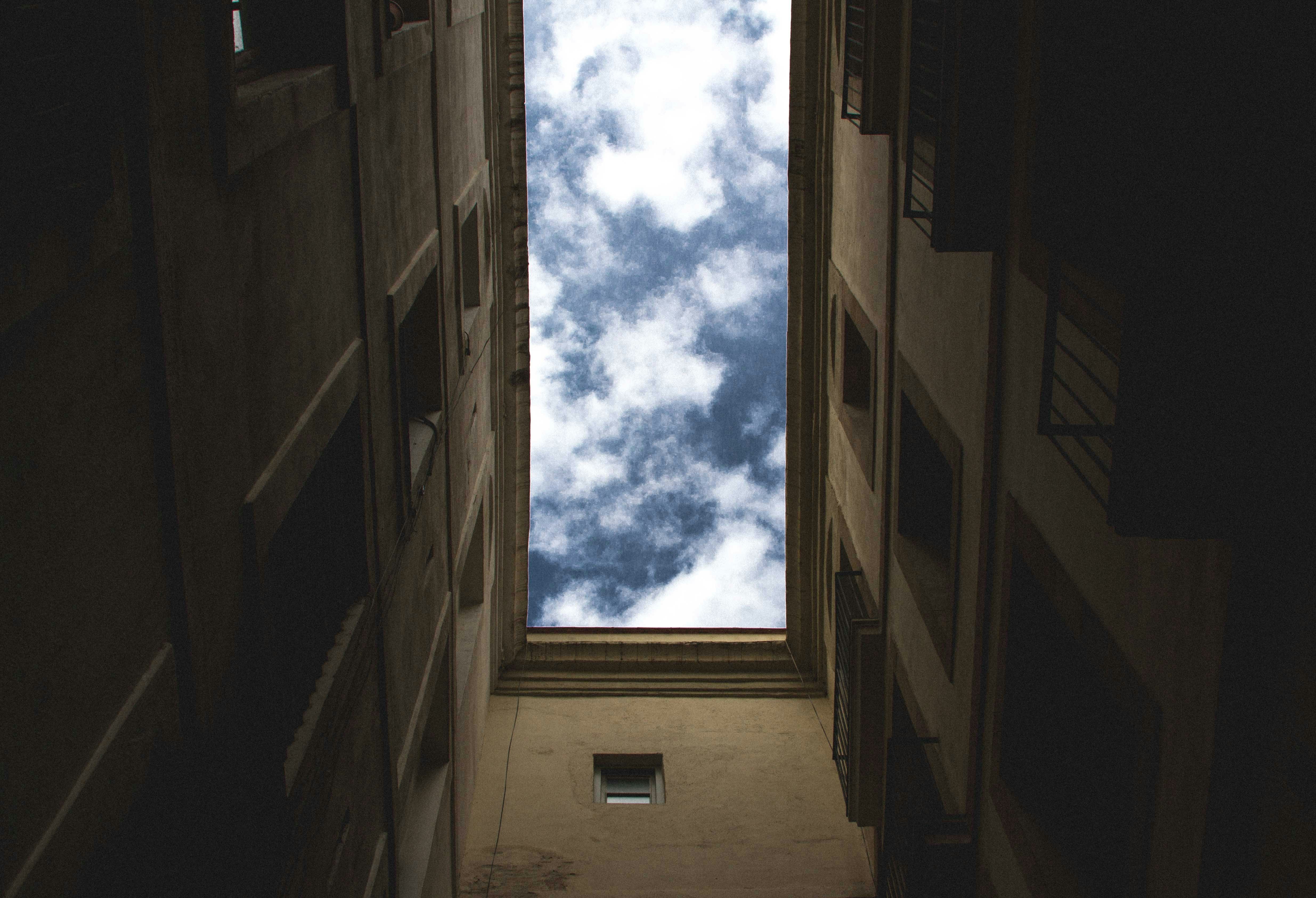 low angle photography of white clouds and blue sky during daytime